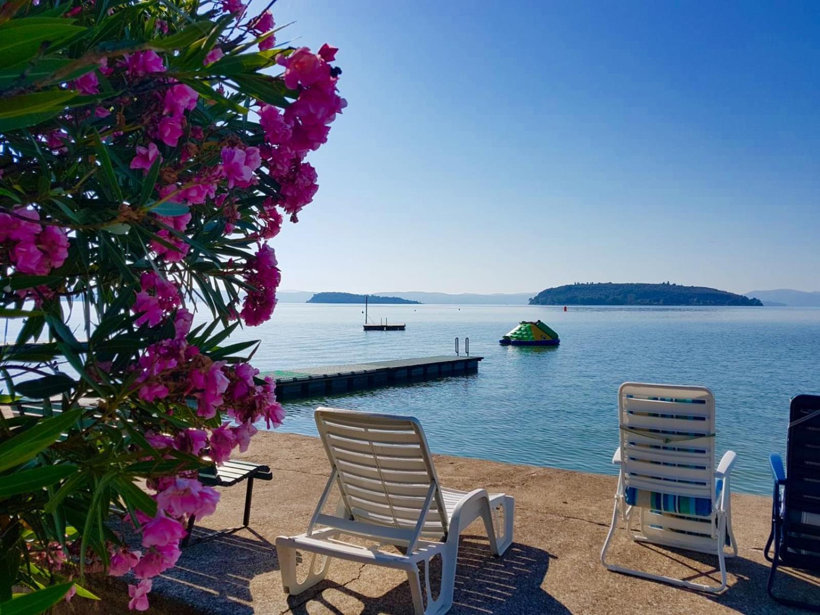 Camping Village Punta Navaccia Туоро-суль-Тразимено Экстерьер фото